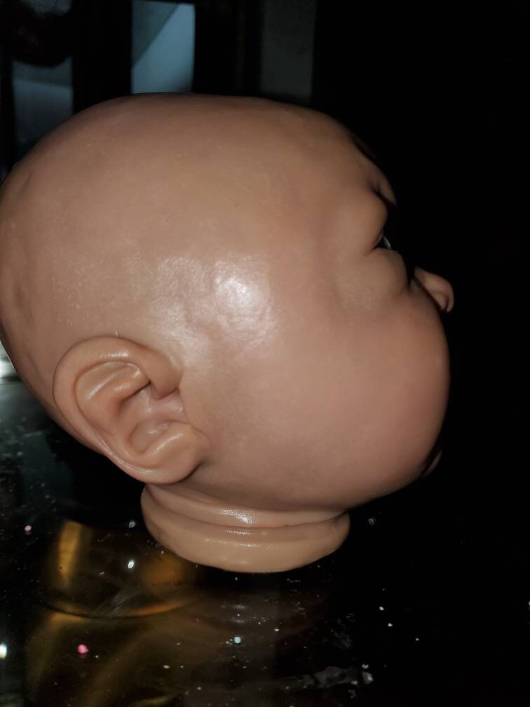 Silicone baby head mold for pouring your own babies