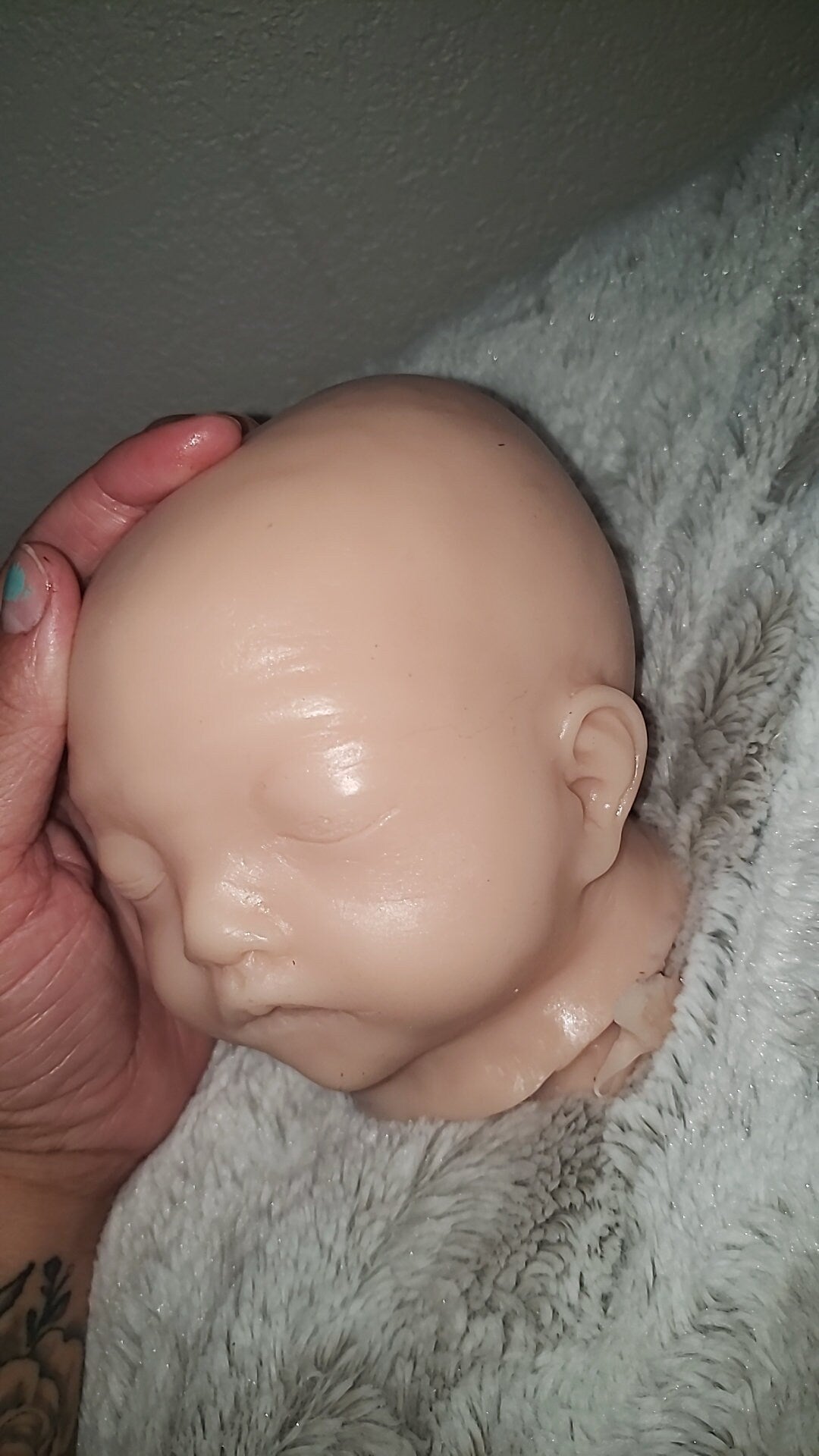 Silicone baby head for cuddle body