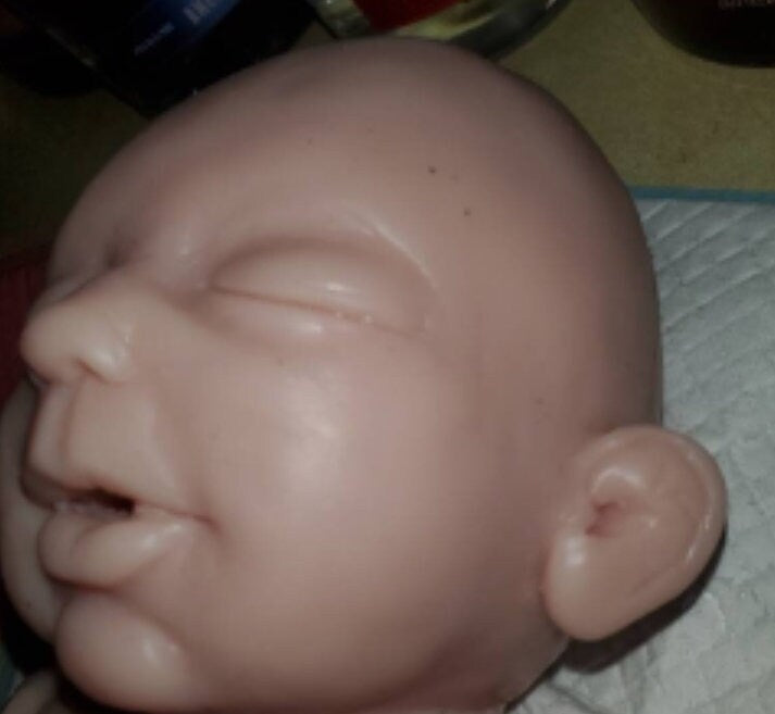 silicone baby head miles