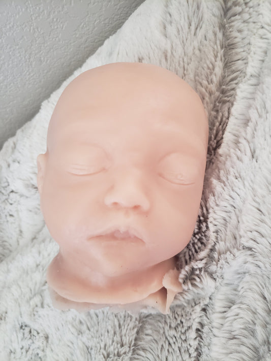 Silicone baby head for cuddle body
