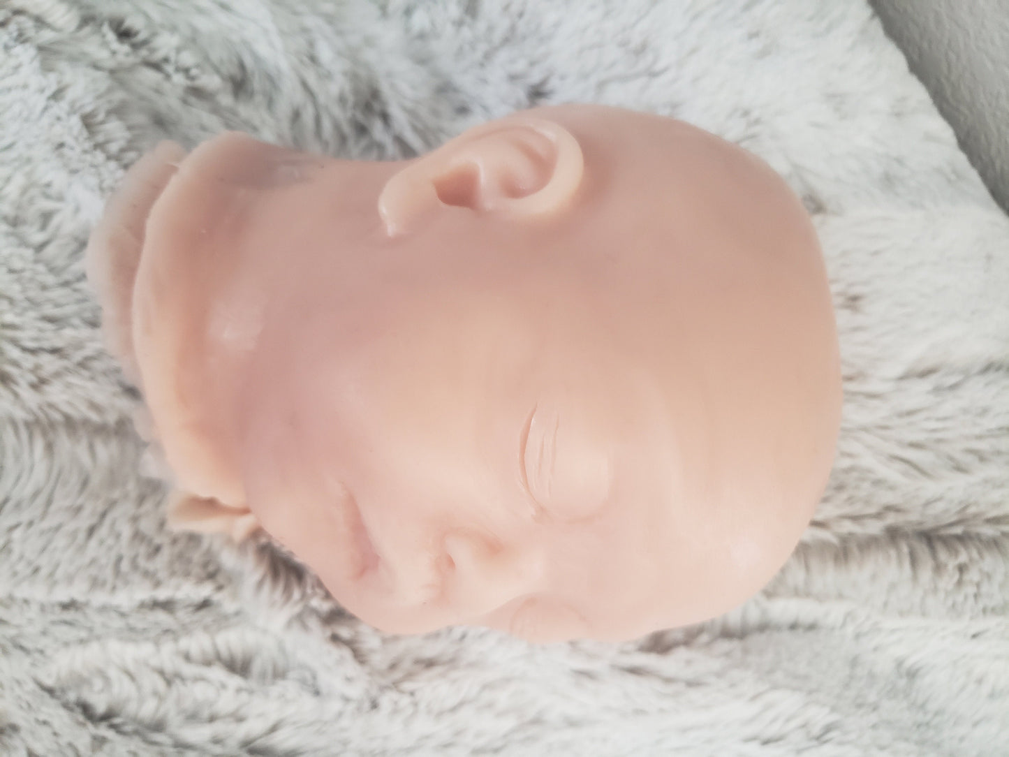 Silicone baby head for cuddle body
