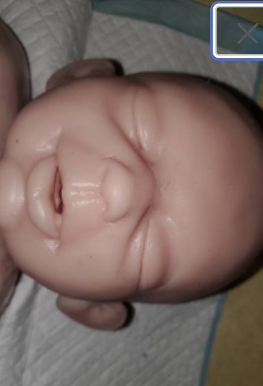silicone baby head miles