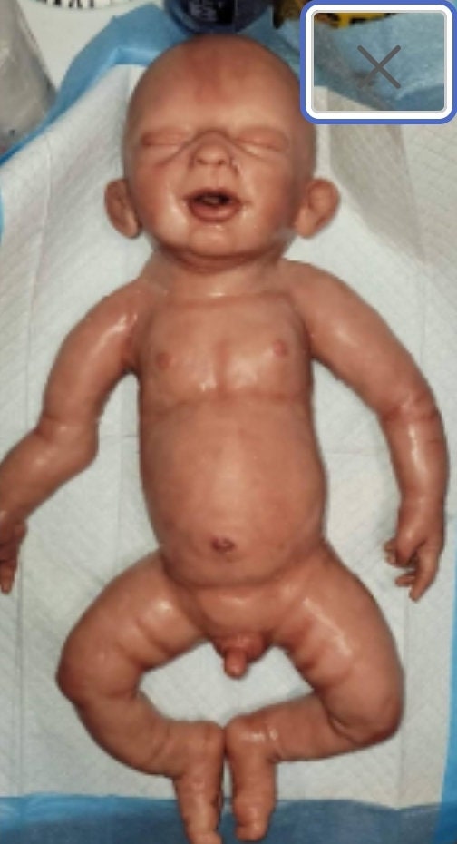 silicone baby head miles