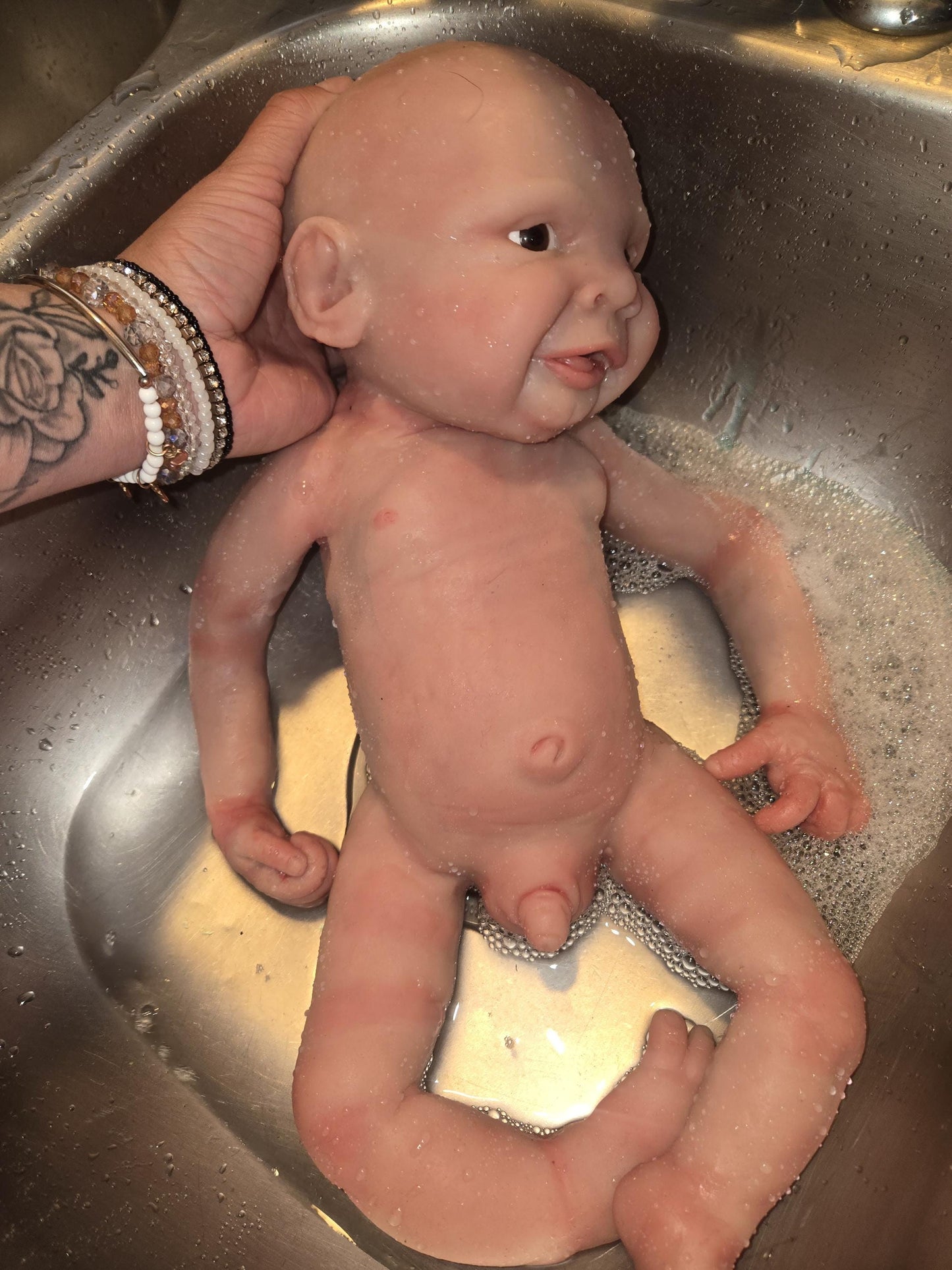 Full body silicone baby boy smiley boy by Dianna richards custom